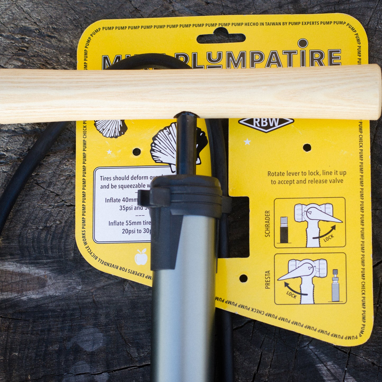 Mike PLUMPATIRE - a wood-handled Floor Pump
