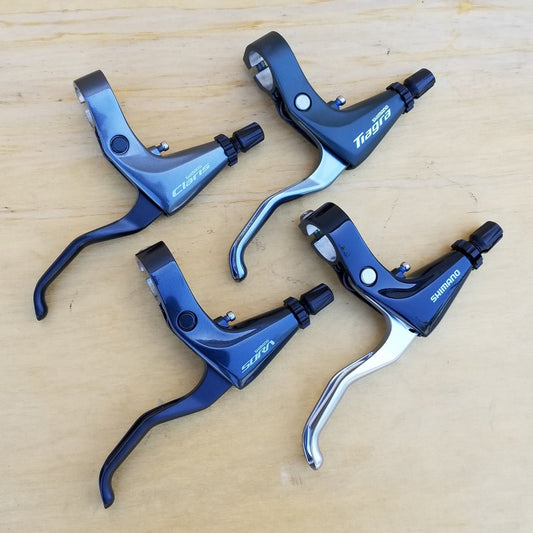 Brake Levers (pair) - Mountain, Shimano. Adaptable to any style of rim brake.