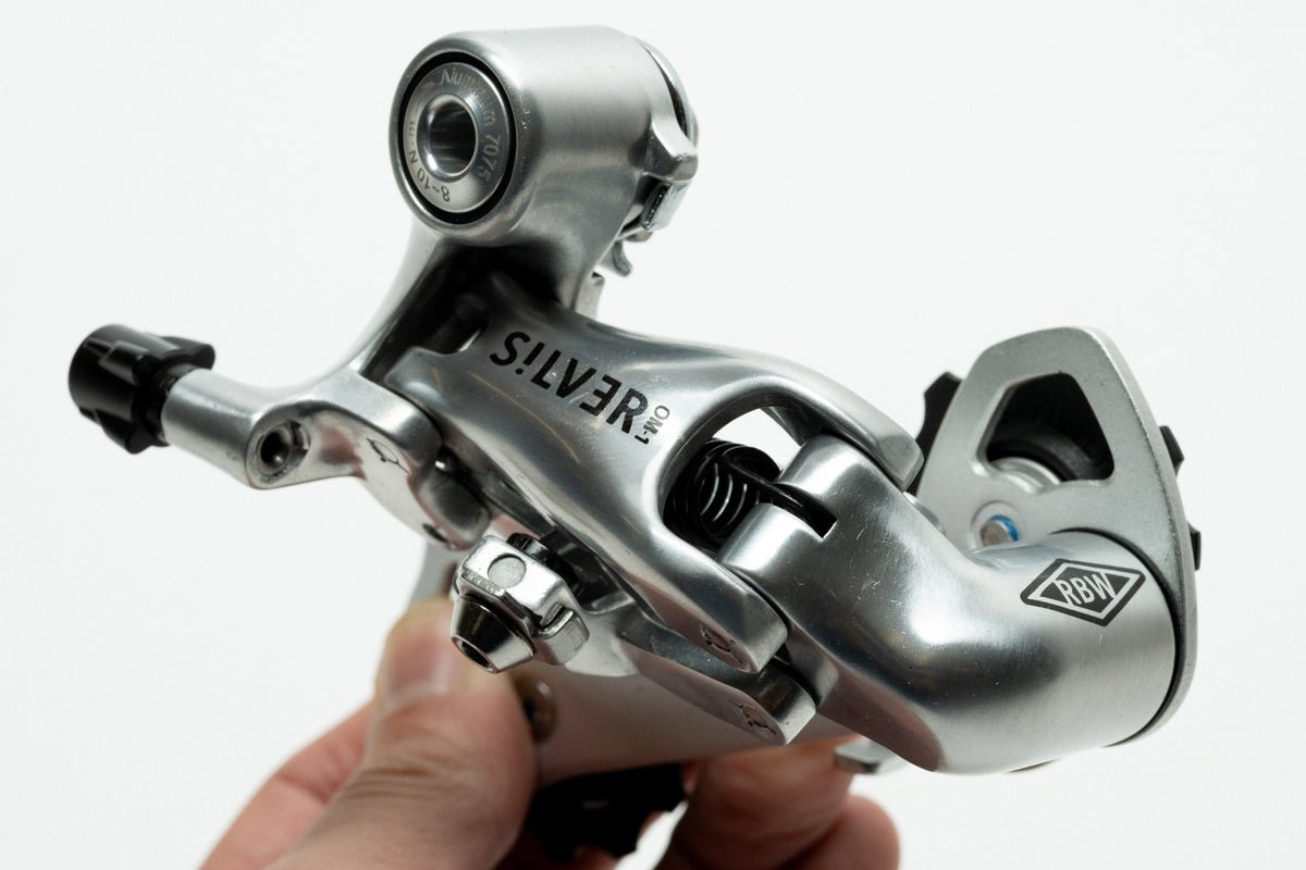 Derailer - Rear - Silver OM-1 (reverse action) - 1 per customer please