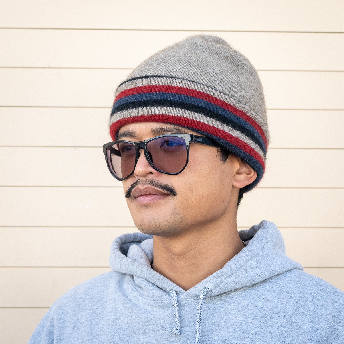 Possum Merino Wool Beanies: Assorted styles and colors.