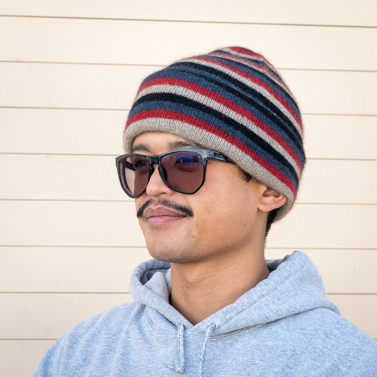 Possum Merino Wool Beanies: Assorted styles and colors.