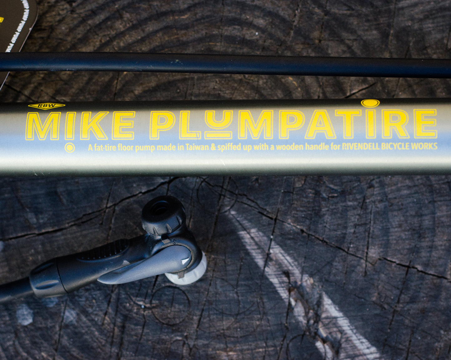 Mike PLUMPATIRE - a wood-handled Floor Pump